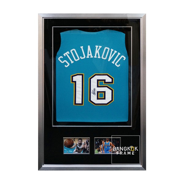 กรอบรูปโชว์เสื้อสะสม